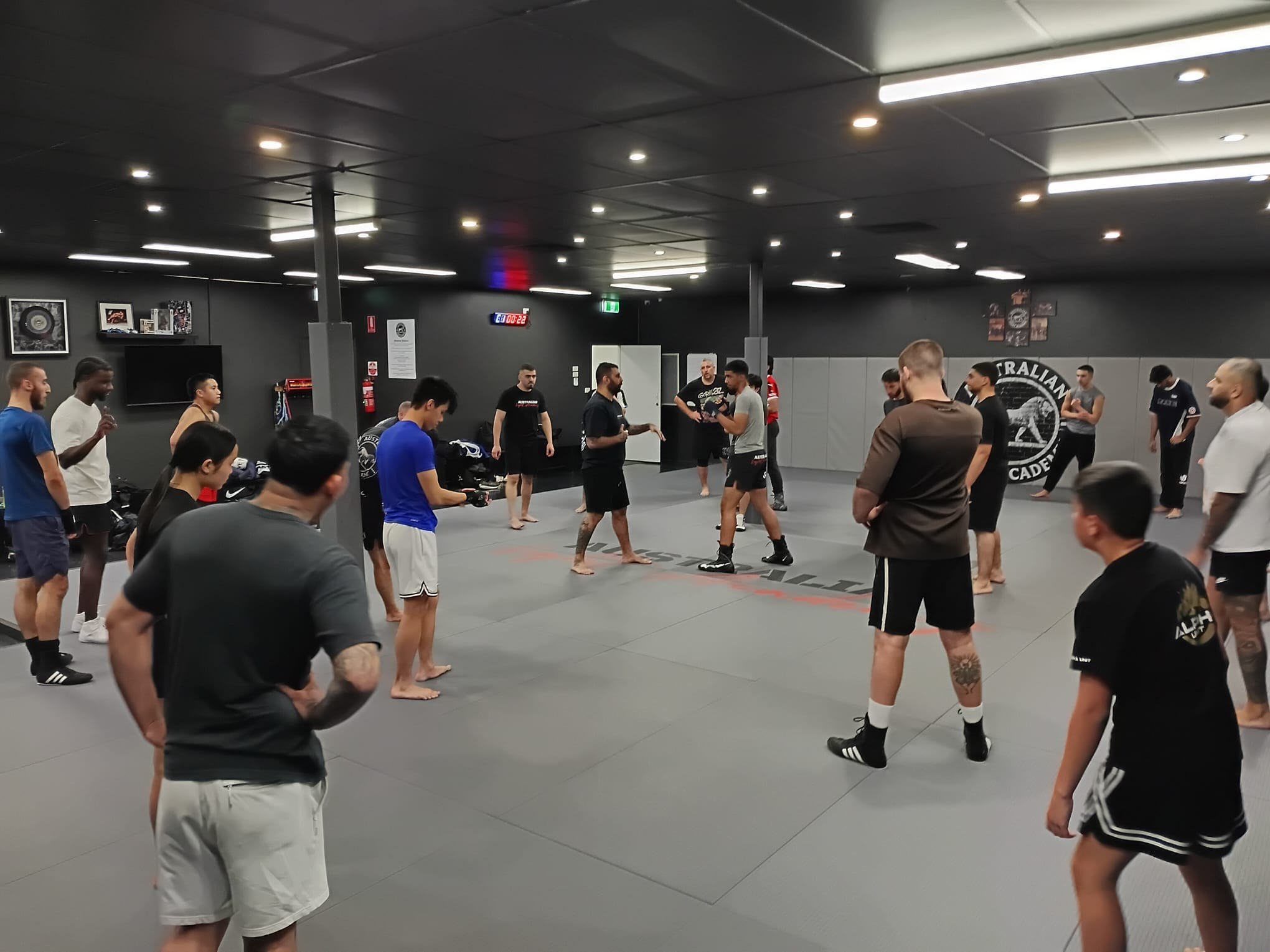 Boxing class pad work at Australian Fight Academy