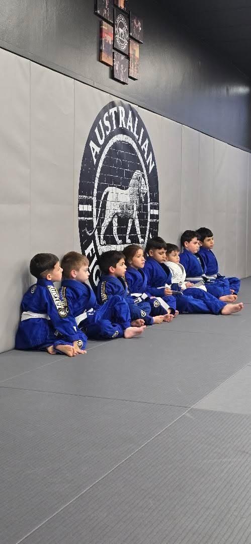 Kids BJJ class sitting together at Australian Fight Academy